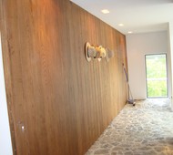 NATURAL WOOD PANELED PIVOT DOOR