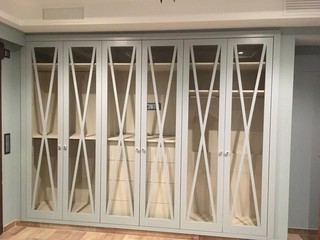 CABINET WITH GLAZED DOORS AND CROSS DETAILS